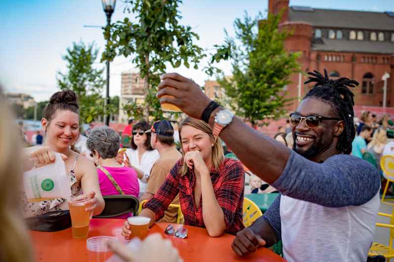 Friends celebrating at the Memorial Union Terrace